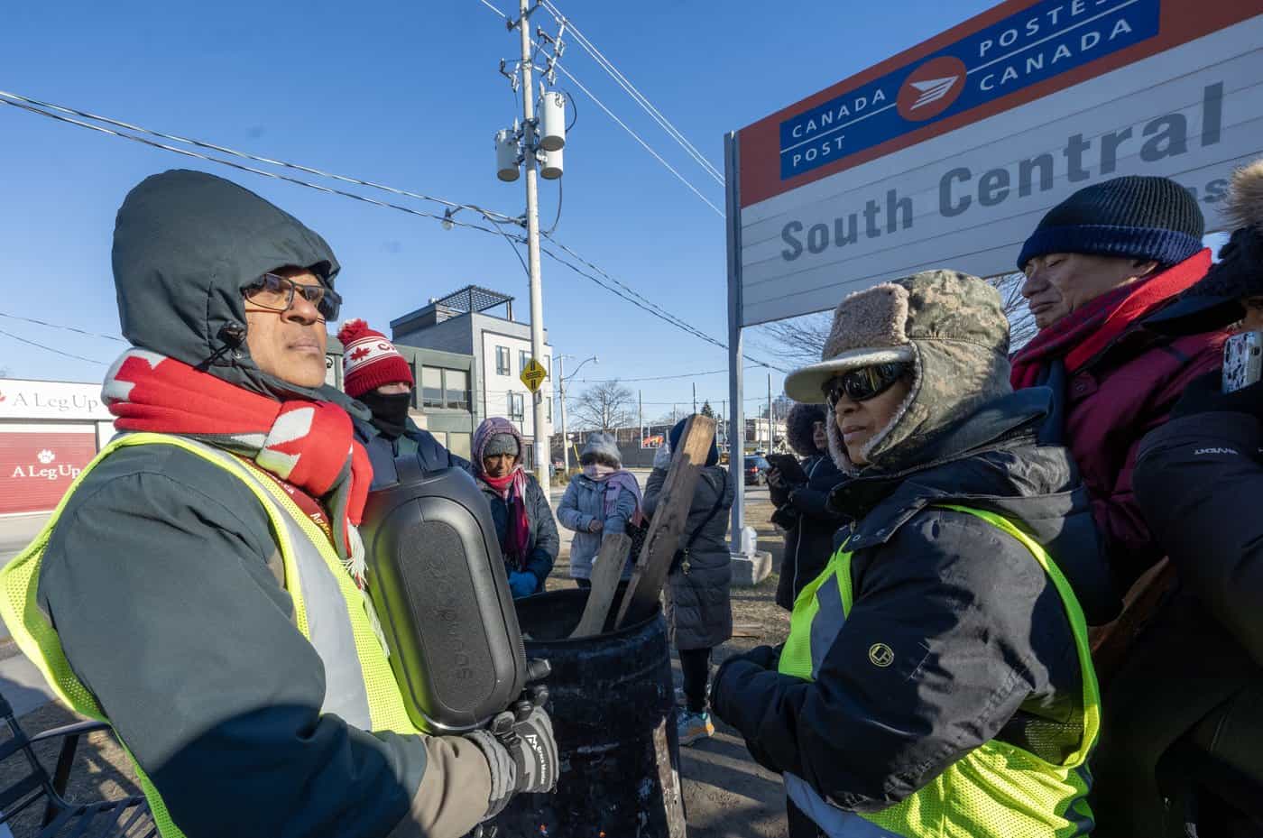 Postal workers on picket line react as Ottawa moves to end strike