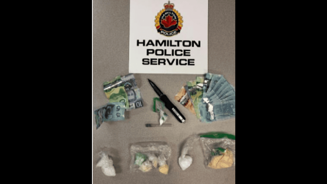 Drugs, weapons and cash seized during traffic stop in Hamilton; motorcyclist charged.